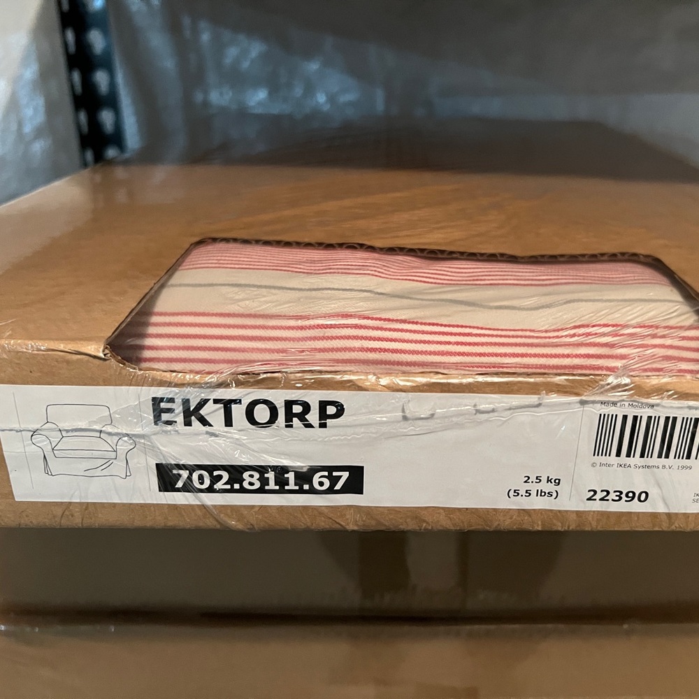 IKEA Ektorp chair cover. New in package. Red/off-white.